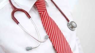 Stethoscope round a doctor's neck