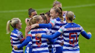 Reading players celebrate Amy Turner's own goal in the WSL