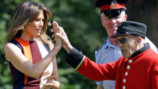 Mrs Trump high-fives a Chelsea Pensioner