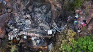 A view of the burnt remains of the bus that was taking Easter pilgrims from Botswana to Moria, following its crash near Mamatlakala in the northern province of Limpopo, South Africa March 29, 2024.