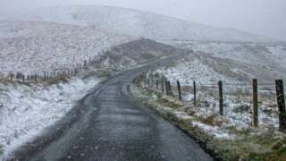 Snow in fields along a country road in Rostrevor in County Down
