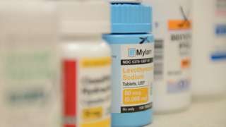 bottles of tablets including levothyroxine