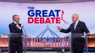 Australian Prime Minister Scott Morrison (R) and the Labor leader Anthony Albanese (L) in a televised debate.