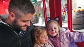 Andy Wilkes with his daughters Penny and Faye