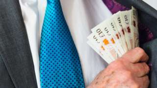 Man with ￡10 notes