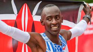 Oct 8, 2023; Chicago, IL, USA; Kelvin Kiptum (KEN) celebrates after finishing in a world record time of 2:00:35 to win the Chicago Marathon