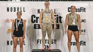 Top 3 podium with winning athletes at CrossFit games
