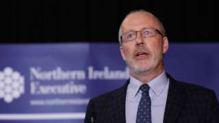 Prof Ian Young speaking during a press conference