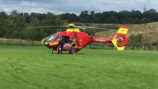 Air ambulance on football field