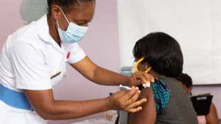 A woman receiving the Covid vaccine