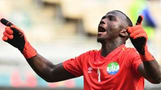 Mohamed Nbalie Kamara celebrates his clean sheet against Sierra Leone