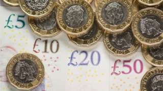 Pound coins and notes