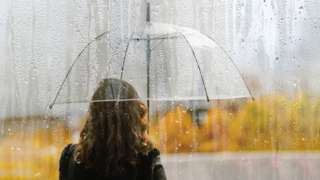 Woman with brolly