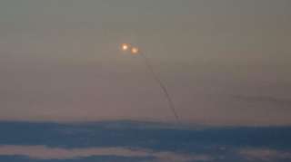 An explosion of a drone is seen in the sky over the city during a Russian drone strike, amid Russia's attack on Ukraine, in Kyiv, Ukraine June 20, 2023.