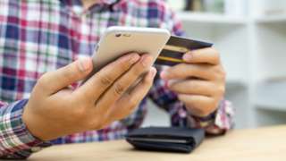 Person using credit card