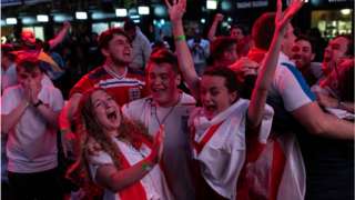 Fans celebrating England's victory against Denmark