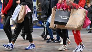 Members of the public are seen shopping during the Boxing Day sales on December 26, 2021 in Glasgow