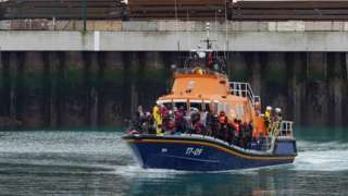 An RNLI boat bringing people into Dover