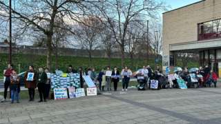 Protestors outside York Barbican centre