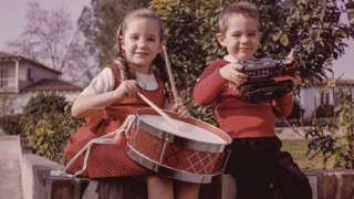 Boy and girl with toys