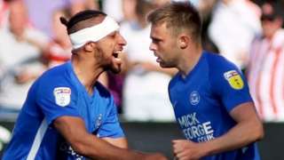Matt Godden (right) celebrates.
