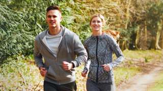 Man and woman jogging