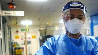 A nurse in full Covid PPE at King's College Hospital, London