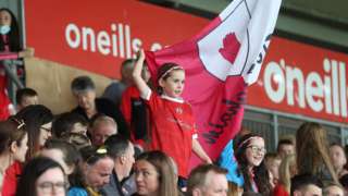 Tyrone fans welcome home their victorious team