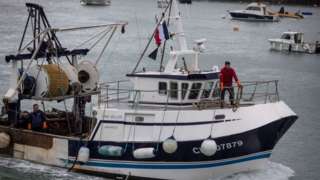 File pic of a French fisherman returning after protests in Jersey's waters