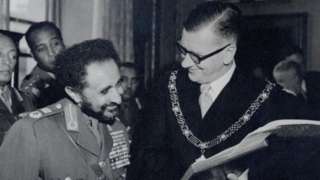 Black and white photo of Emperor Haile Selassie pictured left with the Mayor of Bath, Cllr. Gallop pictured right
