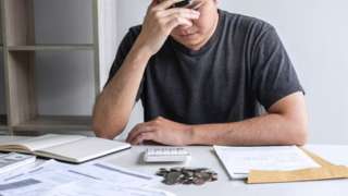 Man stressed about money