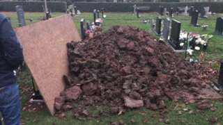 Mound of earth on top of Mr Hegarty's grave