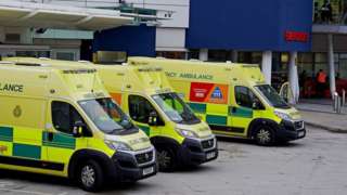 Ambulances parked outside a hospital