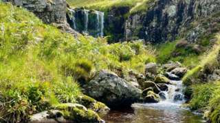 Three Sisters Falls in the Hen Hole gorge in Northumberland's Cheviot Hills