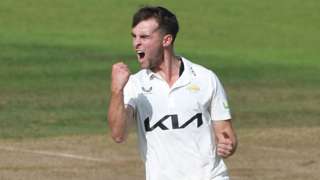 Tom Lawes takes a wicket for Surrey