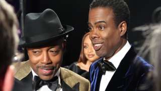 Will Packer (left) with Chris Rock backstage during the Oscars