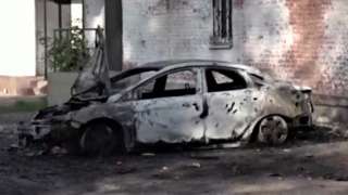 A car damaged in shelling in the town of Shebekino