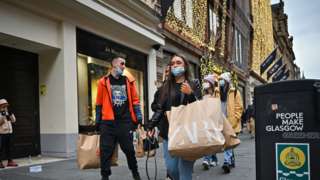 Members of the public are seen shopping during the Boxing Day sales on December 26, 2021 in Glasgow,