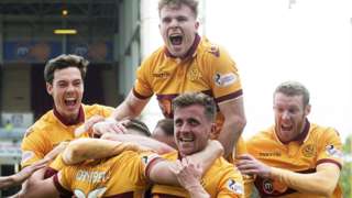 Motherwell players celebrate Allan Campbell's goal