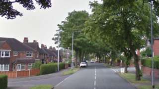 Hempstalls Lane at the junction with Beattie Avenue in Newcastle-under-Lyme, Staffordshire.