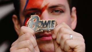 Employee wearing shop merchandise