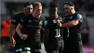 Nick Tompkins celebrates a Saracens try