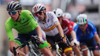Slovenia's Tadej Pogacar in action with riders during the men's elite road race