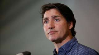 Canada's Prime Minister Justin Trudeau makes comments at an evacuation centre providing services for people fleeing the fires near Yellowknife, Northwest Territories, in Edmonton, Alberta, Canada, August 18, 2023.
