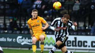 Rhys Healey has a shot on goal against Notts County