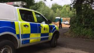 Police are at the site where a man was found dead