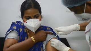 A woman being vaccinated in Chennai, India
