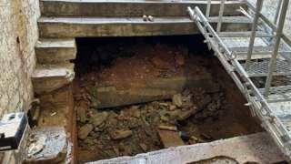 Remains found under the subway steps