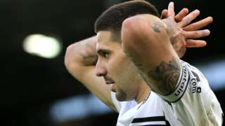 Fulham captain Aleksandar Mitrovic puts his hands on his head after missing a chance against Wolves