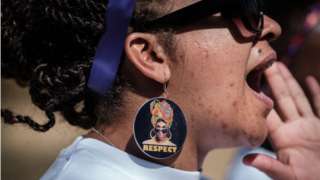 A woman shouts slogans as she participates in a feminist march, held to call a halt to the nation's femicide, in Nairobi on March 8, 2019, on International Women's Day.